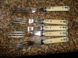 Vintage Bone Handled Forks Set Of 7 " With 3 Tines And Decorated Handles Steel