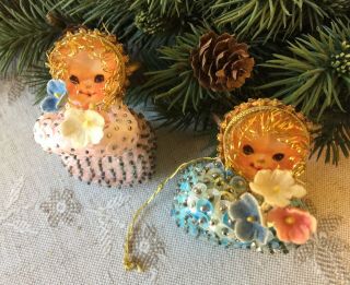 2 Vintage Mid - Century Beaded Sequin Christmas Ornaments Angels Holding Flowers