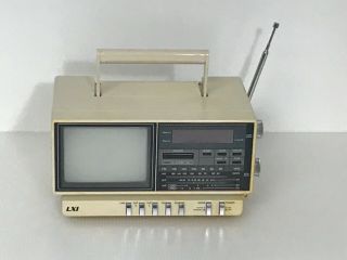 Vtg 1988 Lxi Portable Tv/am Fm Radio Sears Model 580.  50311850