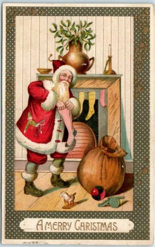 Vintage 1908 Merry Christmas Postcard Santa Claus In Red Suit / Stockings N3015
