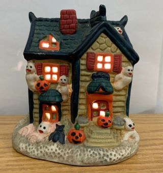 Vintage Halloween Haunted House Lighted Ceramic Ghost Pumpkin Size: 5” X 5” X 4”