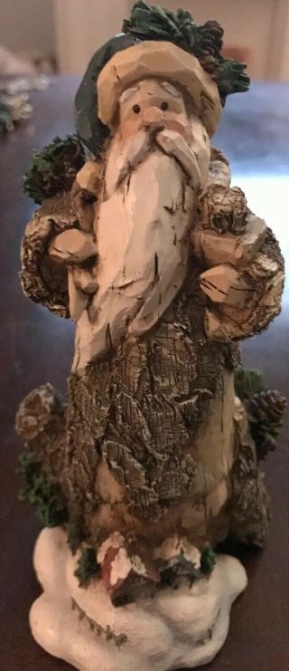 Vintage Primitive Santa Claus Figurine Brown Green Carved Look Woodsy Resin 7”