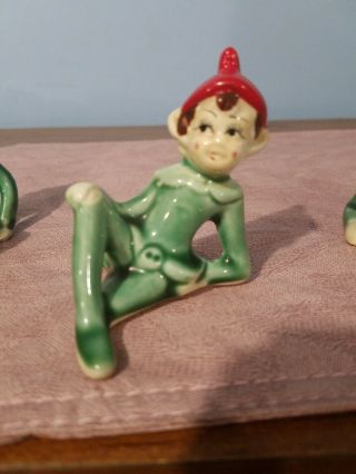 Figure: Ceramic Christmas Pixie,  Elf Laying On Side,  Green W/red Hat Japan,  Vtg