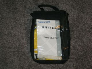 1 United Airlines Demo Kit,  Life Vest,  Mask.  Seat Belt Safety Card 737 & Bag