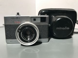 Vintage Minolta Autopak 700 Camera 126 Film 35mm F/2.  8 Rokkor Lens Silver Black2