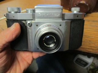 Praktiflex 35mm vintage SLR Camera CARL ZEISS TESSAR 1:3.  5 F= 5CM RED T 2