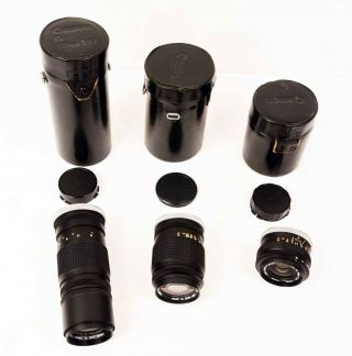 Three Vintage Canon Fl Lenses,  135mm F:3.  5,  35mm F:3.  5,  200mm F:4.  5 With Cases