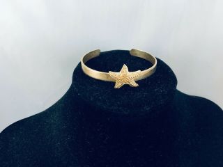 Vtg.  Sarah Coventry Textured & Shiny Gold Tone Starfish Cuff Bracelet