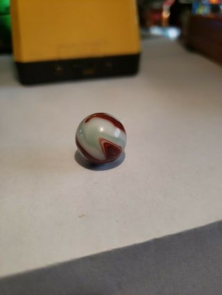 Vintage Akro Agate Silver Oxblood Marble.  5/8 " Inches