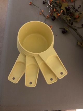 Vtg Tupperware Measuring Cups Set Of 4 Yellow - 1/2,  2/3,  3/4,  1 C.