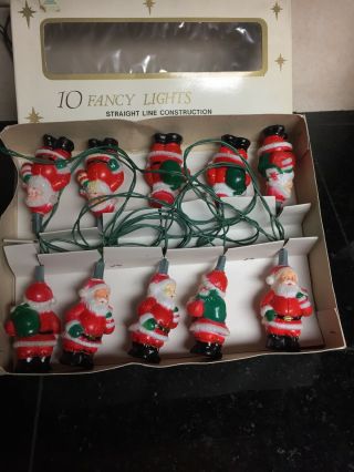 Vintage 10 Light Miniature Christmas Light String With Santa Claus Reflectors
