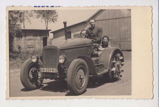 Man And Woman Pose On Old Hanomag Diesel Tractor Vintage Photo