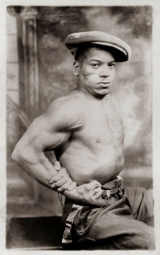 Vintage Photo African American Man Flexes His Muscle