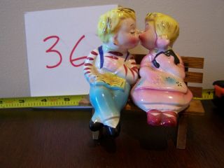Vintage Boy And Girl Kissing On Bench Salt And Pepper Shakers
