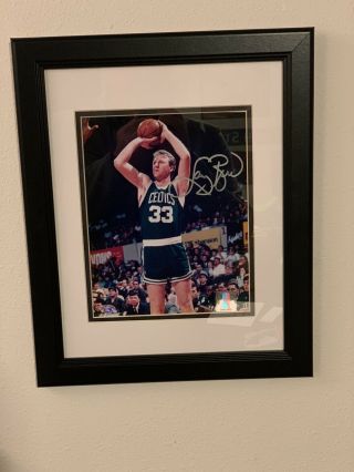 Larry Bird Framed Autographed Photo.  Size Is 13.  5” X 16.  5” With.