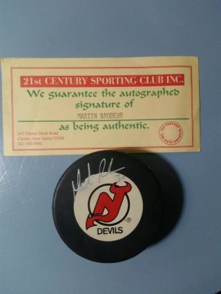 Martin Brodeur Autographed Puck Jersey Devils (1995)