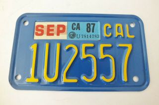 California 1987 Blue Motorcycle License Plate No.  1u2557 - Near With Tags