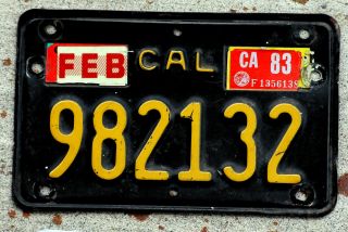 1963 Yellow On Black California Motorcycle License Plate With A 1983 Sticker