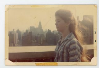 Fading Memory.  Pretty Girl Against City Skyline.  Vintage Color Snapshot Photo