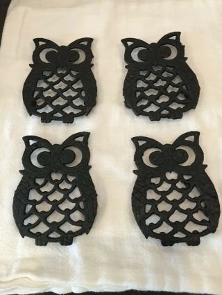 4 Vintage Black Cast Iron Small Owl Trivets.  Marked With Tawain.  4 " By 3 "