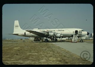 25 - 35mm Dynacolor Aircraft Slide - Trans Meridian London Dc - 7 G - Awbi In May 68