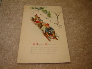 Vintage Christmas Postcard Children Old Fashioned Sled Toboggan