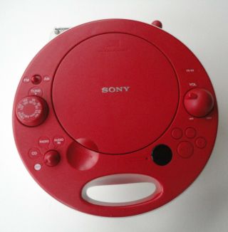2 Sony ZS - E5 Red AM FM Radio CD & 1987 Yellow Sports Watchman FD - 45A FM B/W TV 2