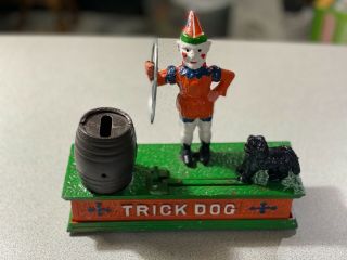 Vintage Trick Dog Cast Iron Mechanical Coin Bank Clown Hoop Dog Barrel