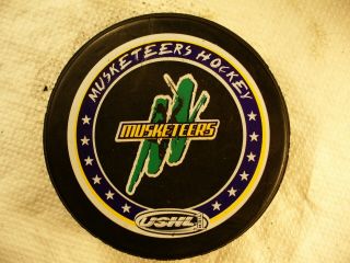 Ushl Sioux City Musketeers Purple Ring Logo Official Hockey Puck Collect Pucks