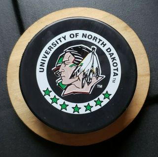 North Dakota Fighting Sioux Wcha Official Game Hockey Puck Post 2000