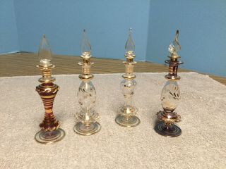 4 Egyptian Perfume Bottles Blown Glass Hand Painted With Gold Trim