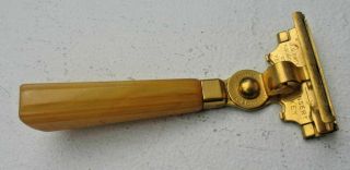 Vintage Art Deco Schick Injector Razor With Amber Colored Bakelite Handle
