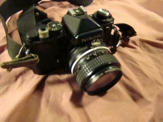 Nikon 35mm Camera,  28mm Lense,  1:28