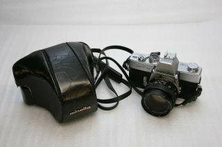 Minolta Srt 101 Camera And Lens,  Filter,  Flash Bundle W/ Cases