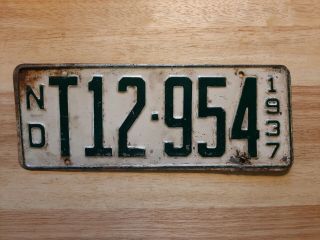 1937 North Dakota License Plate,  Paint,  White & Green T12 - 954