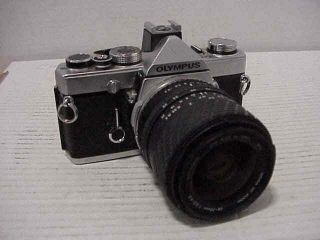 Olympus Om - 1 Md 35mm Camera With Sigma Uc Zoom 28 - 70mm F/3.  5 - 4.  5 Lens