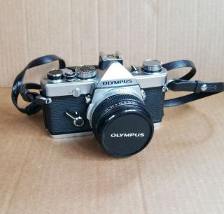 Olympus Om - 1 35mm Film Slr Camera & Olympus 50mm F.  Zuico Lens 1:1.  8