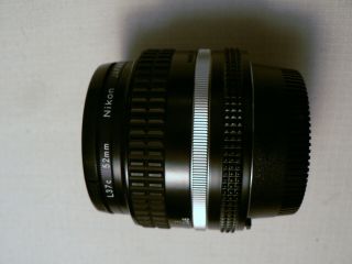 Non Ai Nikon Nikkor 50mm 1:1.  4 Slr Film Camera Lens With Both Lens Caps Japan