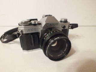 Canon Ae - 1 35mm Slr Film Camera W/ Canon Lens Fd 50mm 1:1.  8