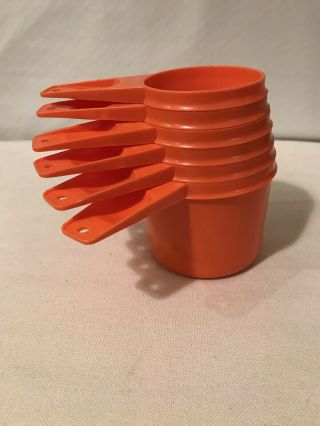 Vintage Tupperware Orange 6 Piece Measuring Cup Set