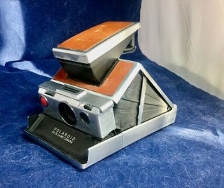 Sx - 70 Polaroid Camera Set With Case,  Books,  Flashbulbs And Film