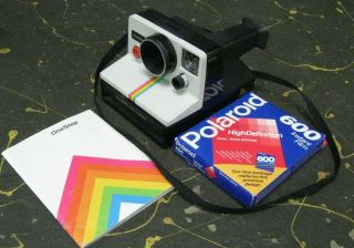 Polaroid Onestep Camera W/ Film And Instruction Book