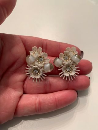 Vintage Gold Tone White Plastic Rhinestone Flower Clip On Earrings Coro Signed