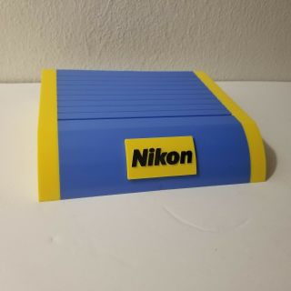 Nikon Camera Display Stand Blue And Yellow Plastic Vintage 90s 7.  5 X 6.  5