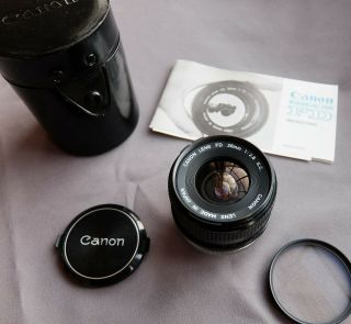Canon Fd 28mm F2.  8 Lens,  Caps & Filter In Canon Case.