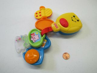 Vintage Fisher Price Musical Keys Key Chain Nursery Rhyme Songs Spins Rattle Toy