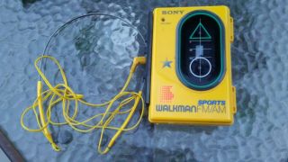 Sony Walkman Sports FM/AM Radio w/Cassette Player Headphones MDR - W15 (PARTS OR 2