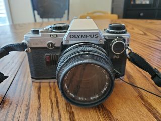 Olympus Om - 10 35mm Slr Film Camera Body And 50mm Zuiko Lense
