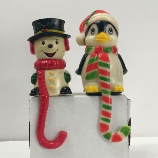 Vintage Two Christmas Stocking Holder Hard Plastic Penguin And Snowman 6 Inches