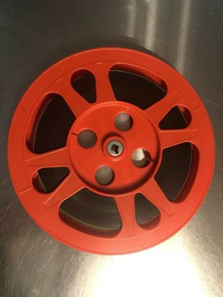 10.  5” Red Plastic Film Reel 16mm With Film And Case
